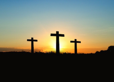 three crosses at sunset